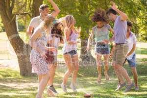 Friends having fun with powder paint