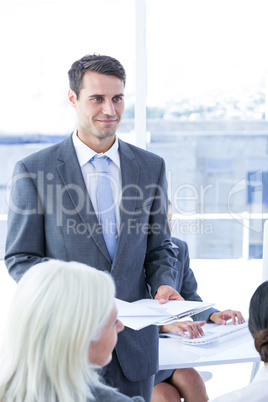 Businessman give a paper