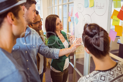 Young colleagues in discussion at office