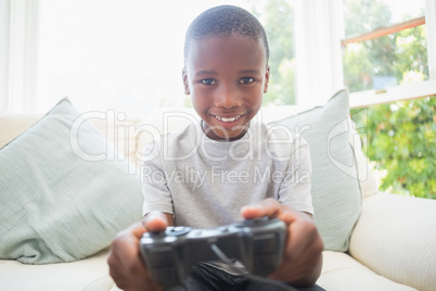 Little boy playing video games