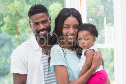 Happy parents with baby girl