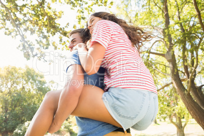 Cute couple having fun in park