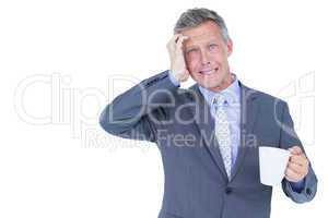businessman drinking cup of coffee