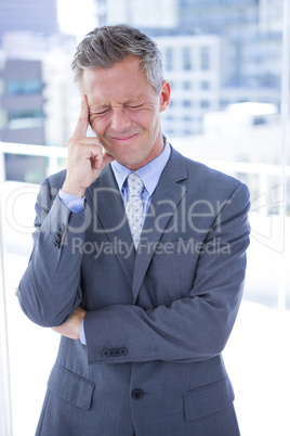 Businessman having a headache