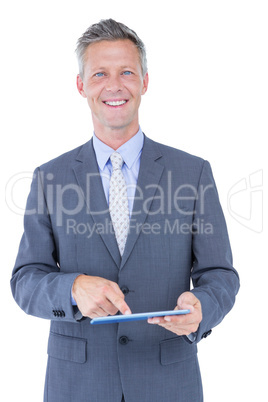 Smiling businessman against a white background