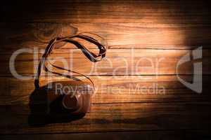 A camera on the wooden table