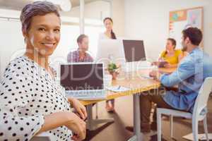 Smiling businesswoman looking at the camera