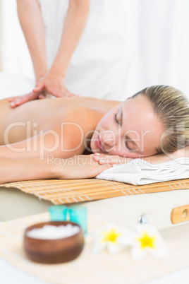 Pretty blonde enjoying a massage