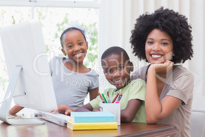 Happy family using the computer