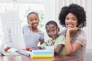 Happy family using the computer