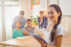 Businesswoman using tablet in the office