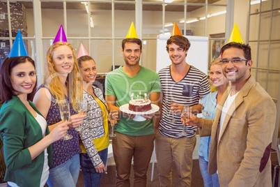 Business people celebrating a birthday