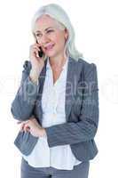 Happy businesswoman calling with smartphone