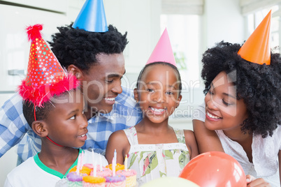 Happy family celebrating a birthday together