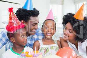 Happy family celebrating a birthday together