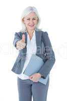 Businesswoman giving thumbs up