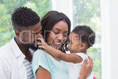 Happy parents with baby girl