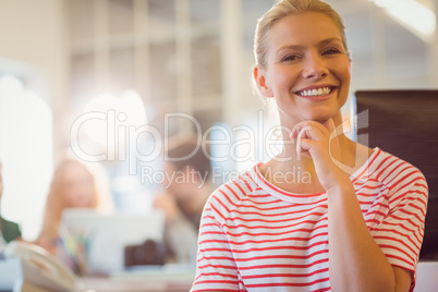 smiling young women using digital tablet