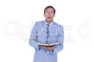 businessman holding a book