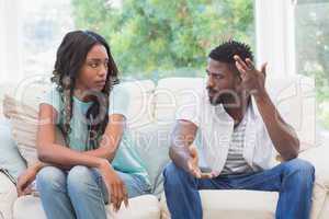 Couple having argument on the couch