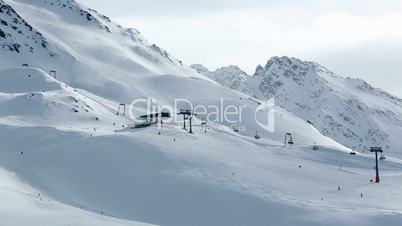 Ski run in Austrian Alps with sunny weather