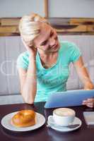 Pretty blonde using laptop computer