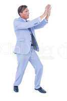Businessman walking while gesturing with hands