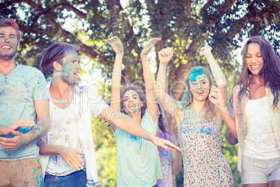 Friends having fun with powder paint