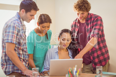 Happy team looking at their work