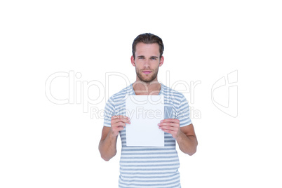 Serious handsome man holding paper