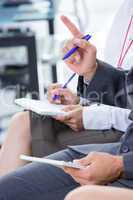 Businessman taking note during a meeting