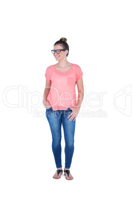Happy pretty casual brunette standing with hand on pocket
