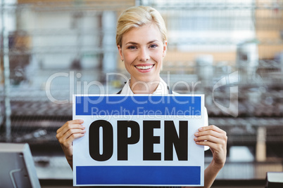 Cafe owner smiling at the camera