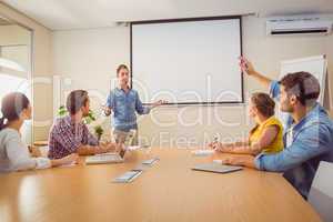 Attentive businessman asking a question