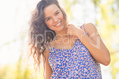 Pretty brunette smiling at camera