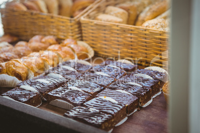 Close up of basket with fresh bread and pastry