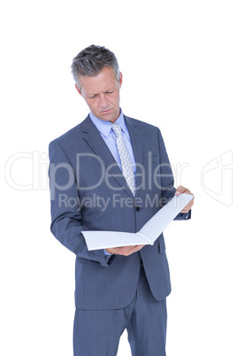Happy businessman holding files