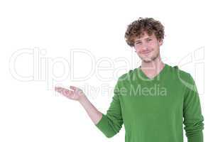 Handsome man holding something in front of camera