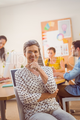 Smiling businesswoman looking at the camera