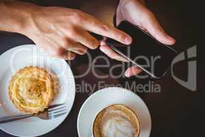 Close up view of pastry and coffee
