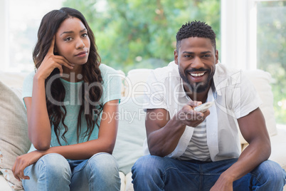 Upset woman being ignored by partner