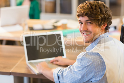 businessman writting on his laptop