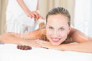 Beautiful blonde enjoying a chocolate beauty treatment