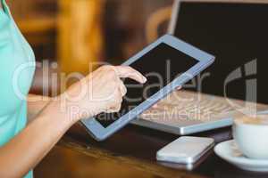 A woman using tablet computer