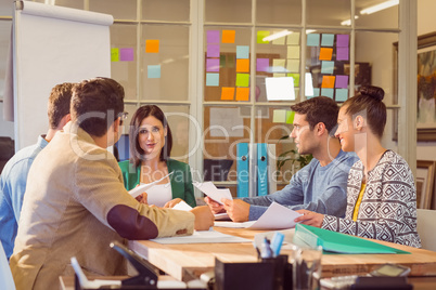 Business people speaking during a meeting