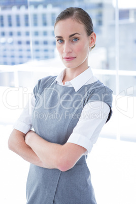 Focused businesswoman looking at the camera