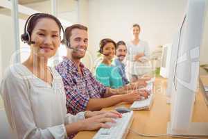 Call center agent working under a manager supervision