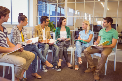 Attentive creative business people in meeting Attentive creative business people in meeting
