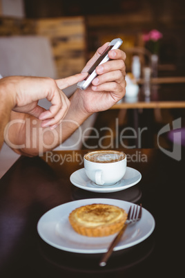 Close up view of hands texting