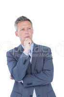 Businessman thinking with hand on chin